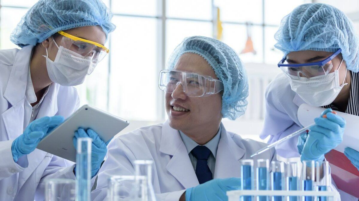 Asian senior scientist male researching and working with chemical hazards