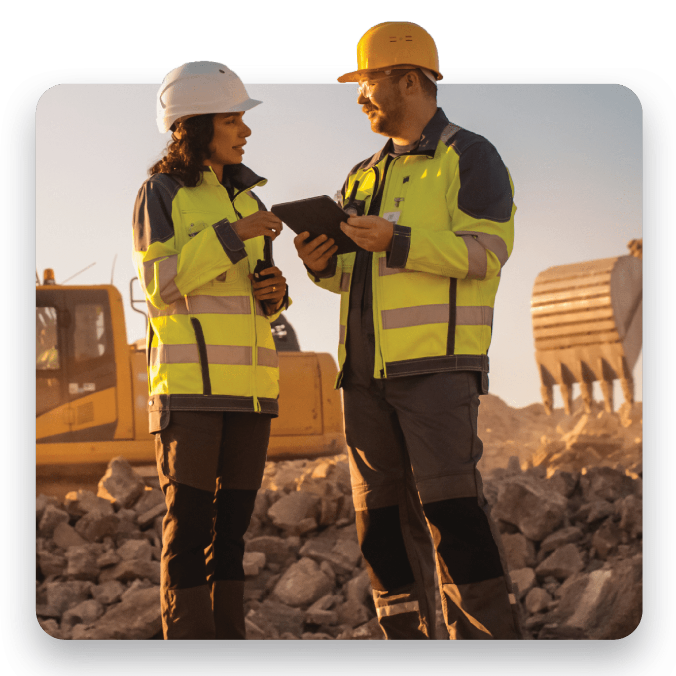 Safety professionals reviewing workplace data on industrial site