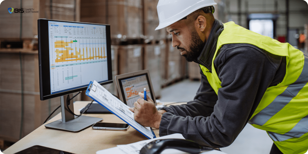 Safety-manager-reviewing-compliance-reports-digitally Digital Folders