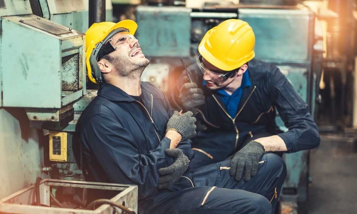 Senior male worker accident in factory.Maintenance worker in the control room of factory.Safety first concpet.