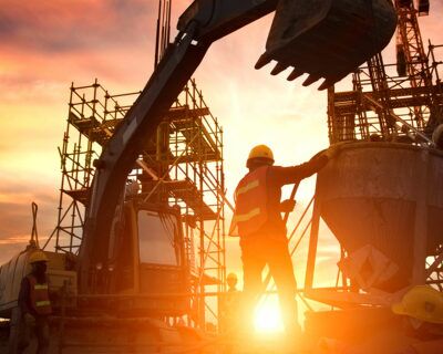 Silhouette Teams of Business Engineers looking for blueprints