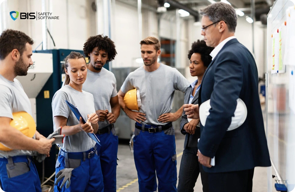 A safety meeting between supervisors and workers.