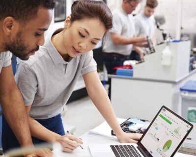 Employee preparing for fieldwork by reviewing digital safety procedures, showcasing how EHS and LMS systems support confident, compliant workers.